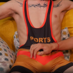 Twink shows his wrestling moves by moving on the cock